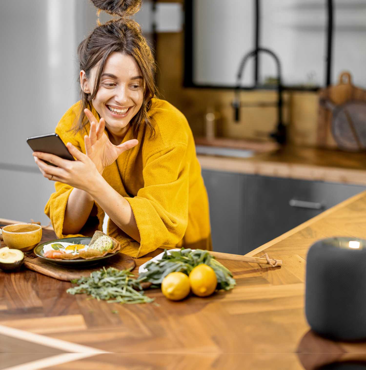 Women using speech-enabled smart speaker